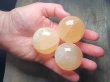 Load image into Gallery viewer, Small Red Selenite Sphere
